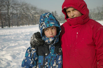 Boys playing at snow