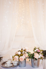 Bouquets of flowers in the bedroom, interior decor, romantic setting