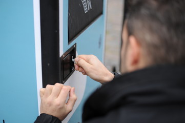 a hand opens the key a door