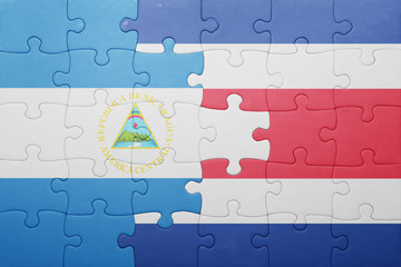 puzzle with the national flag of costa rica and nicaragua