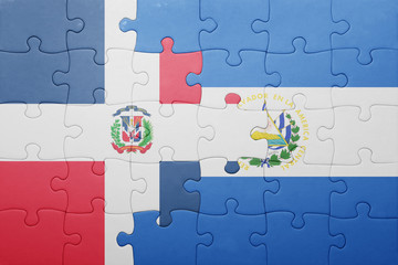 Fototapeta premium puzzle with the national flag of el salvador and dominican republic