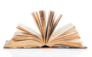 Old book open isolated on white background