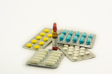 Tablets and capsules in the set