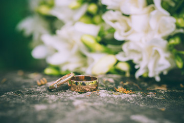 wedding bouquet and wedding rings