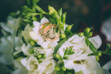 wedding bouquet and wedding rings