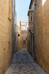 Narrow street of the old city of Mdina in Malta