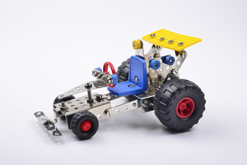 Toy car assembled with metal pieces