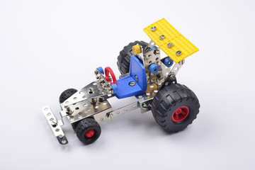 Toy car assembled with metal pieces