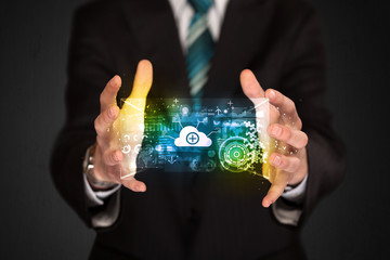 Businessman holding data cloud