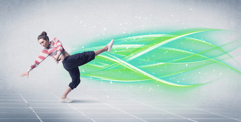 Hip hop dancer posing with green lines