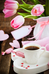 Fototapeta na wymiar Coffee, hearts and tulips