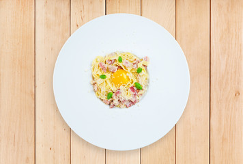 Traditional italian pasta carbonara with bacon and egg
