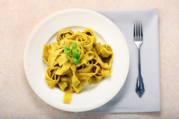Pasta with pesto on a plate