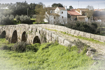 ancient Roman bridge over Ponsul river in Idanha-a-velha historic village, Portugal