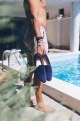 Handsome man by the pool