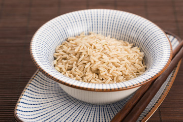 Raw brown rice in a bowl