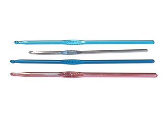 Crochet needles on white background.