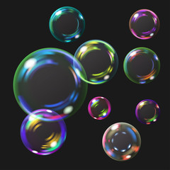 Multicolored transparent soap bubbles with glares. Transparency only in vector format