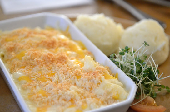 Stock image of baked macaroni and cheese..