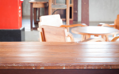 Empty wooden table in coffee shop