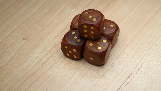 Wood Dice Cubes On Rotating Table