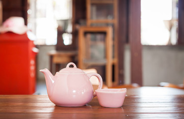Tea pot on wooden table