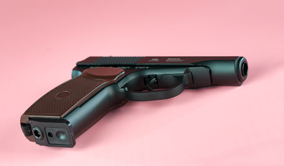 Air gun on pink background