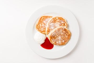 tasty pancakes with sour cream and jam