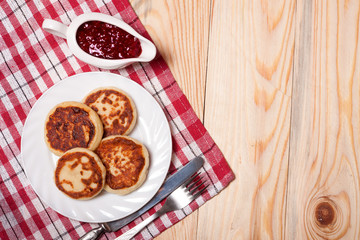 Cottage cheese pancakes, homemade traditional Ukrainian and Russian syrniki