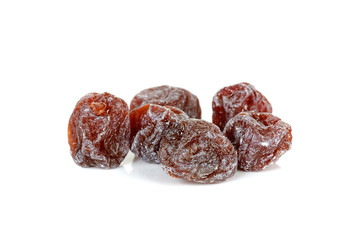 Dried plums isolated on white background