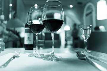 glass of wine, a restaurant serving a blurred background