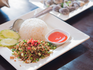 Fried garlic with rice and pepper sauce.  Thai style native food