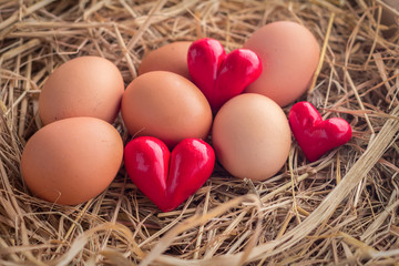 fresh eggs with heart object