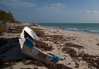 Beached Wrecked Fishing Boat Skiff on Isla Blanca Cancun Mexico