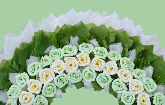 roses flower wreath for use in Thai funeral on green background