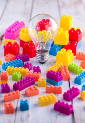 Fototapeta na wymiar light bulb with colorful block toy.jpg
