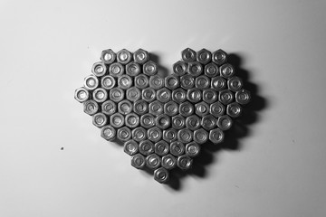 Heart made from screws black and white
