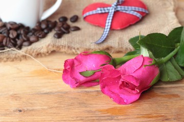 Coffee with coffee beans and red hearts.
