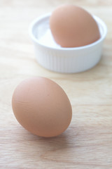 egg on brown wooden background