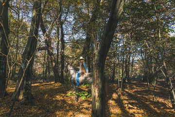 Fototapeta premium Pretty girl riding her grey horse