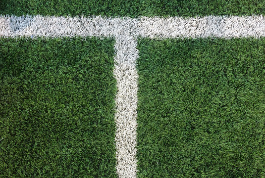 White Stripe Line on Artificial Green Soccer Field as Copyspace to input Text from Top View used as Template