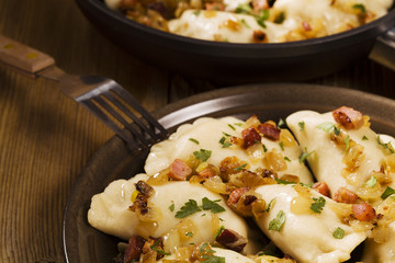 Delicious homemade dumplings with onion and bacon