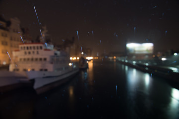 Rain drops in old town Gdansk by night.