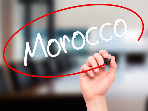 Man Hand writing Morocco  with black marker on visual screen