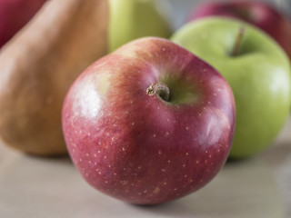 Red,green aplles with pear