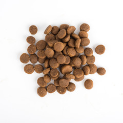 Dried cat or dog food isolated on white background top view