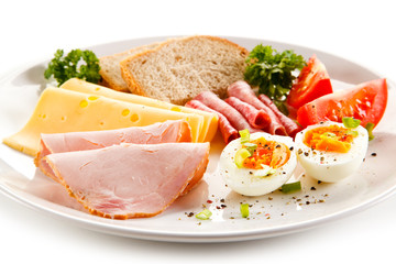 Breakfast - boiled egg, ham, cheese and vegetables 