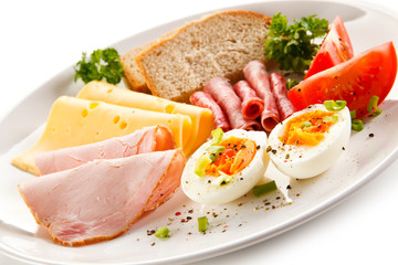 Breakfast - boiled egg, ham, cheese and vegetables 