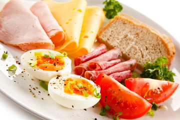 Breakfast - boiled egg, ham, cheese and vegetables 