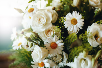 Obraz na płótnie Canvas Fresh Bouquet of White Rose and Chamomile Close Up